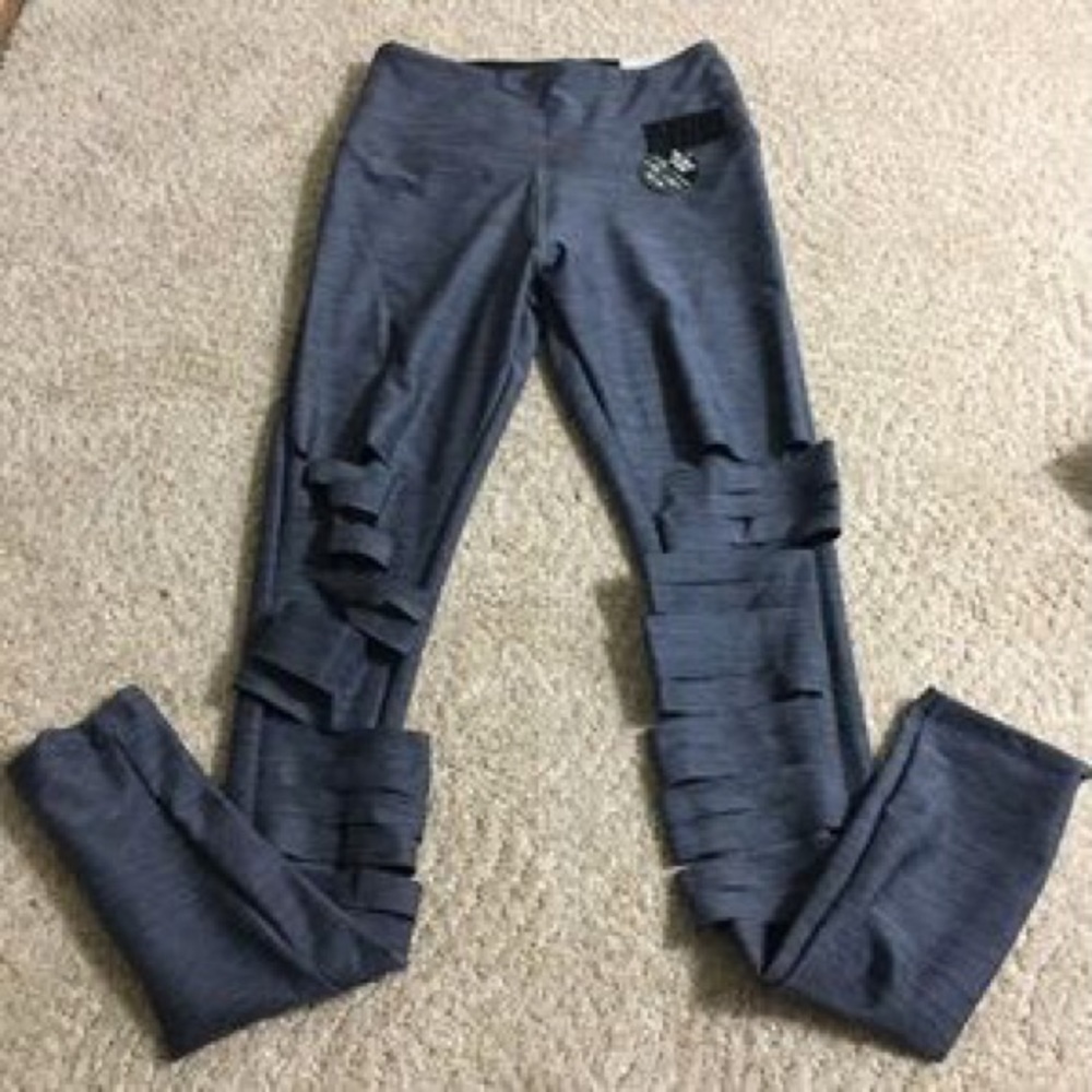 NWOT Pink ultimate ripped leggings